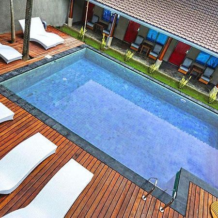 Kayun Hostel Legian Quarto foto